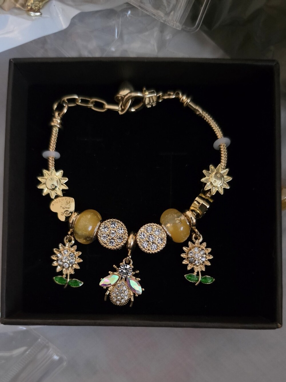 Gold Floral Charm Bracelet with Yellow Beads and Bee Pendant